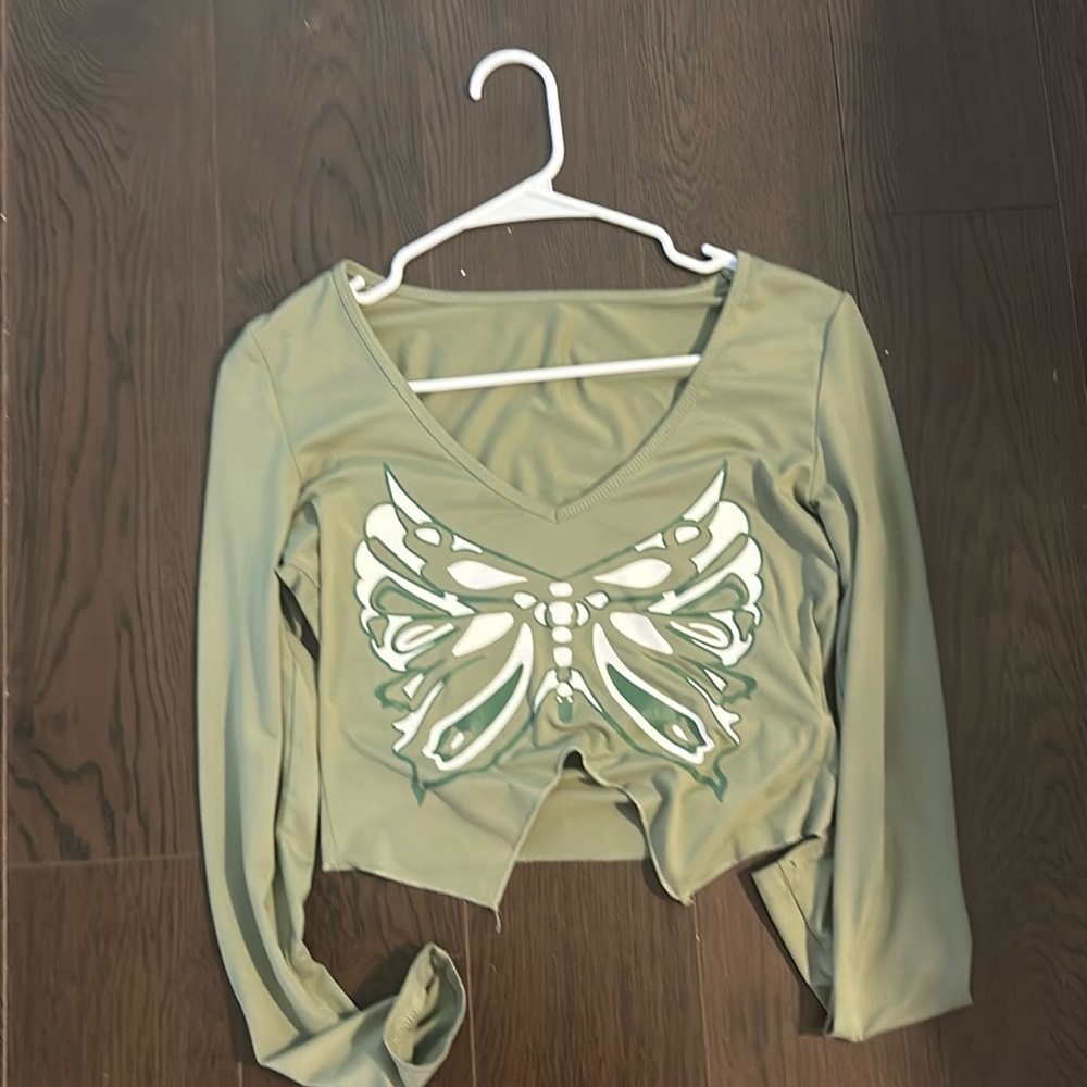 A green butterfly shirt
